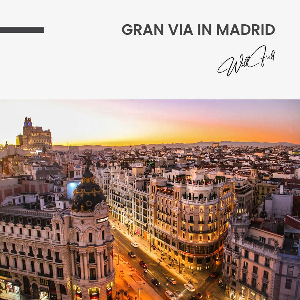 Sunset view of Gran Via in Madrid – Vidrio